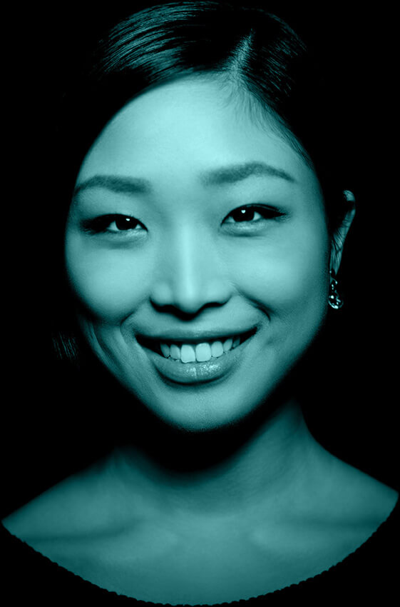 portrait of young asian professional with teal color overlay